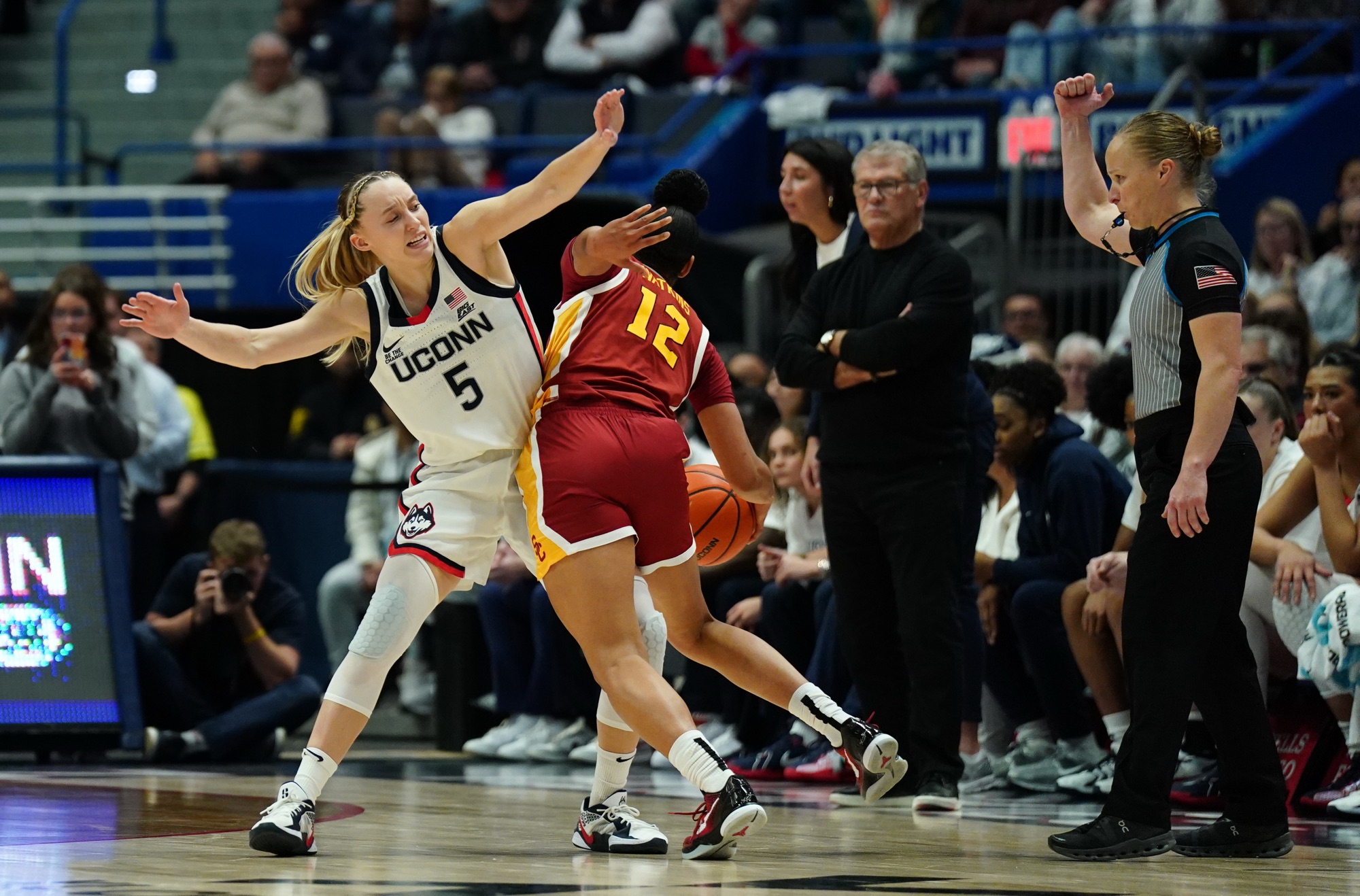 USC, WATKINS OUTLAST UCONN IN A SPIRITED AFFAIR