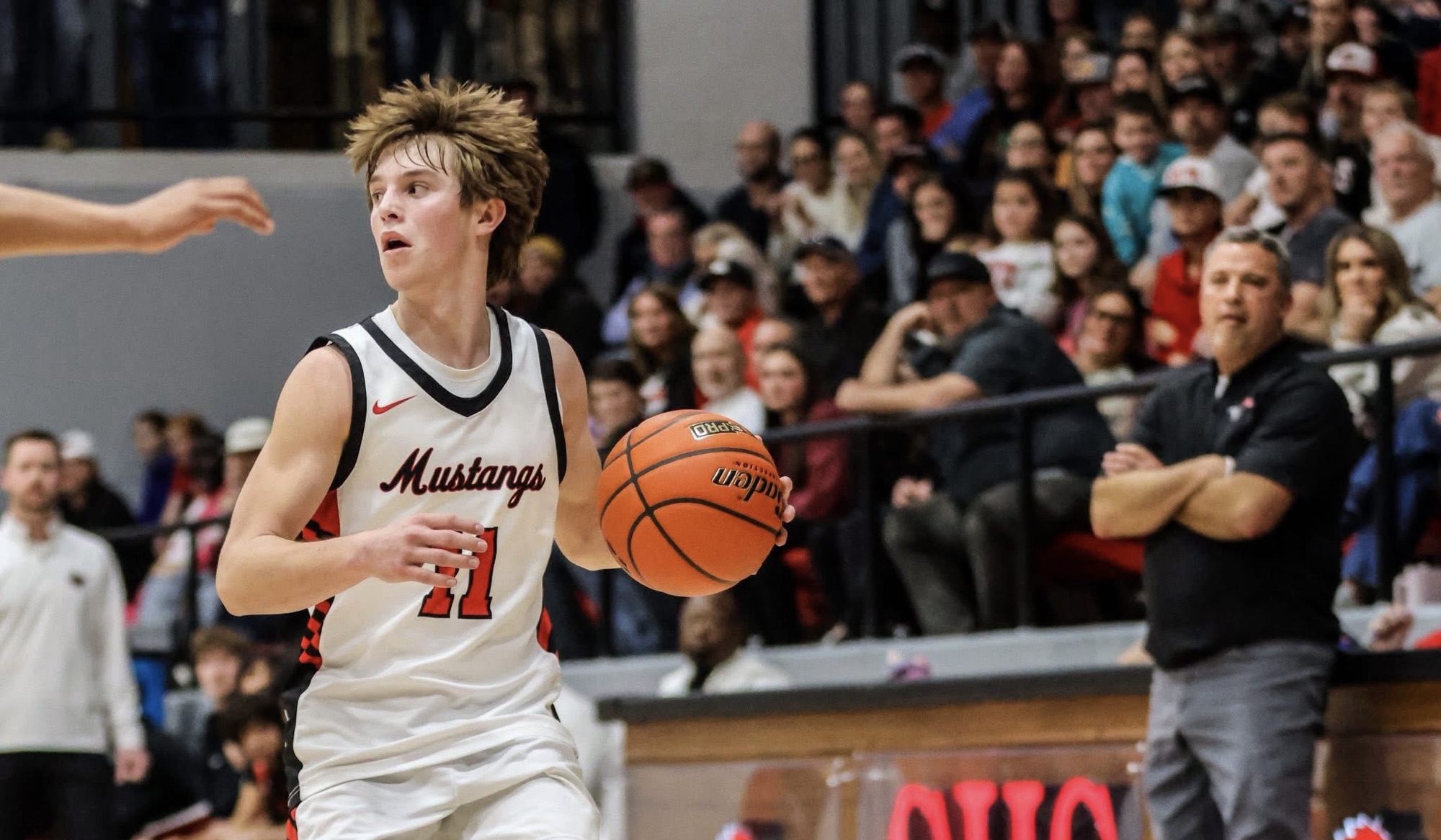 MUSTANGS FEND OFF PESKY TIGERS FOR KEY DISTRICT WIN